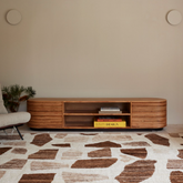 Panama rattan entertainment unit styled in a modern living room